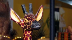 Maskottchen in schwarz-gelb - na klar, eine Giraffe.